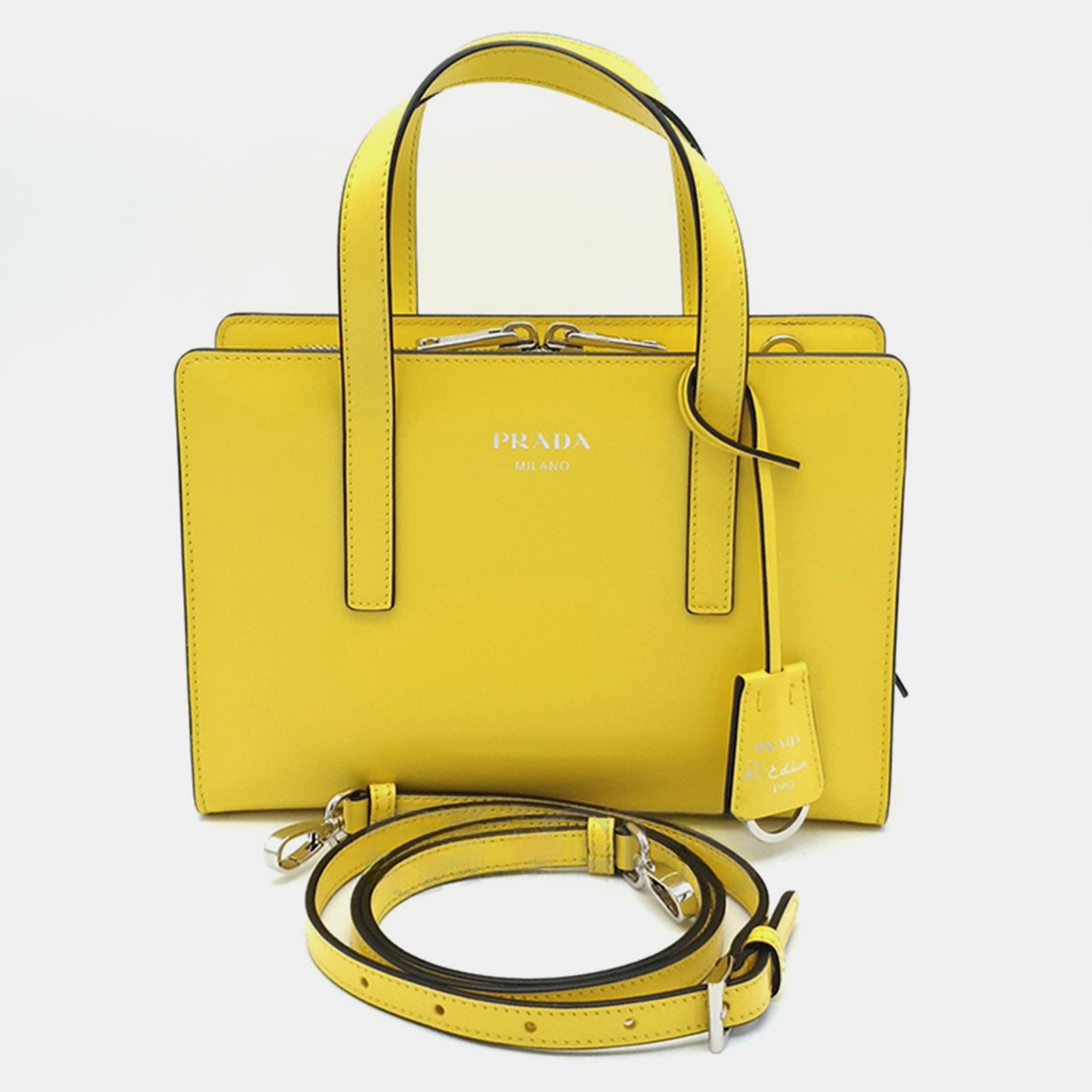 luxury-women-prada-used-handbags-p899466-001 Prada Yellow leather brushed mini tote bag - Image 1